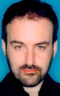 Composer, Actor David Arnold - filmography and biography.